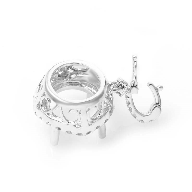 ... pendant is made of 18K white gold and is set with ~.65ct of diamonds